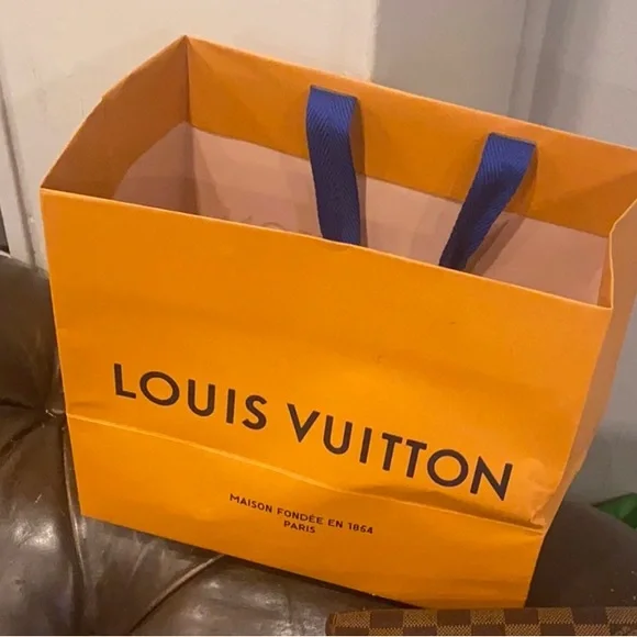 Louis Vuitton Beige garment cloths size Bag16/13